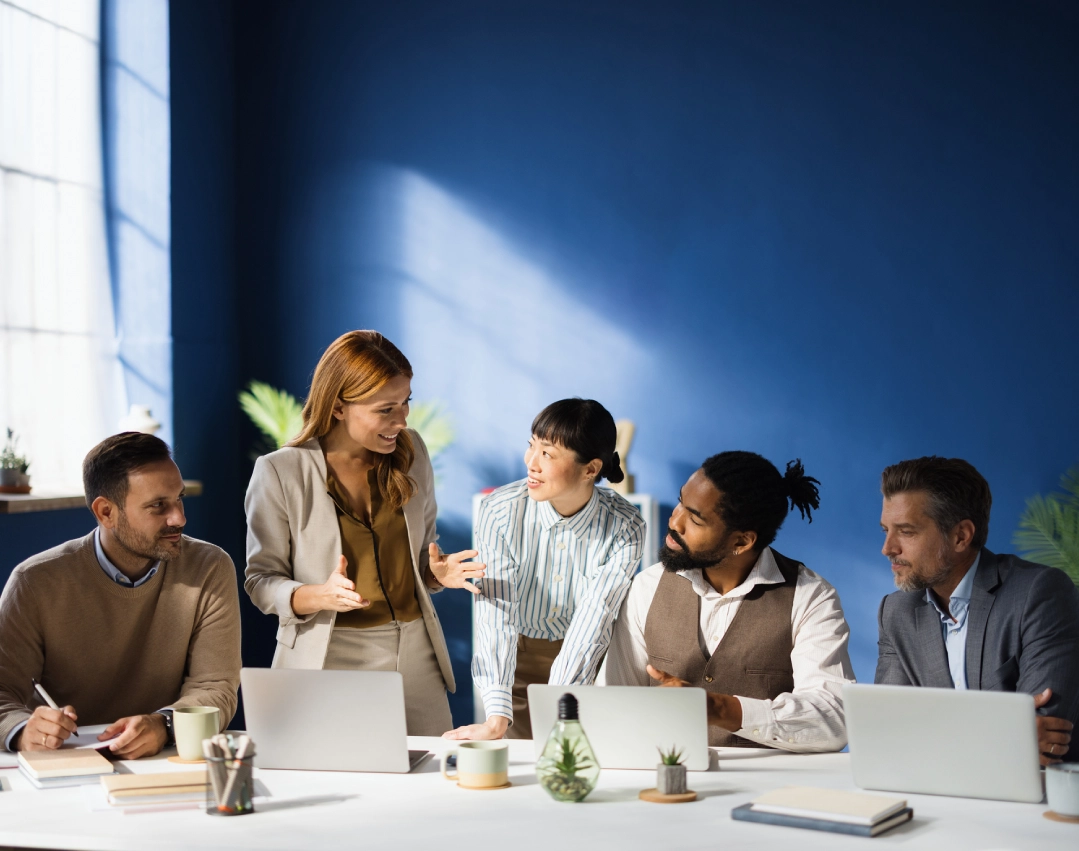 Diverse group collaborating at work